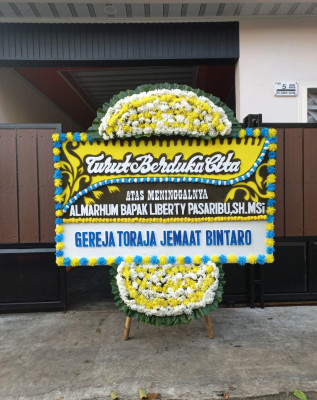 Papan Bunga Duka di Tuminiting
